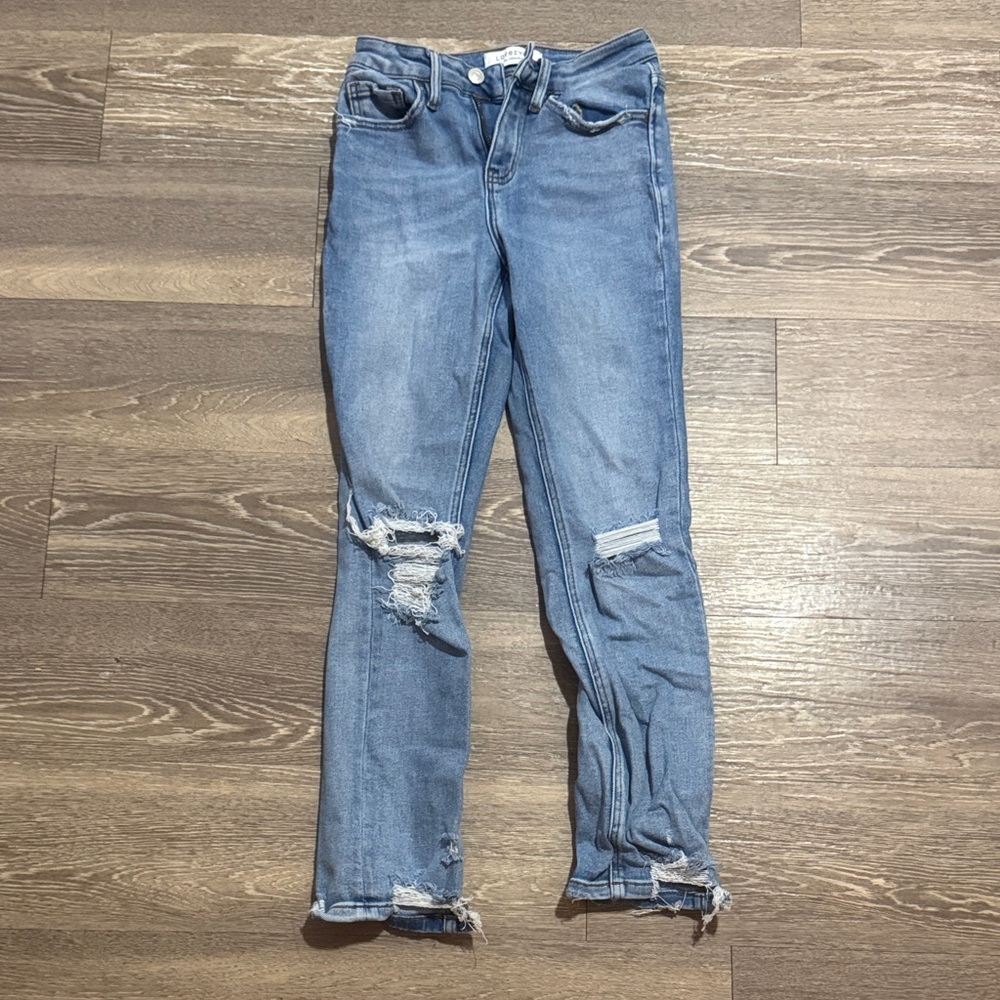 Distressed Blue Jeans